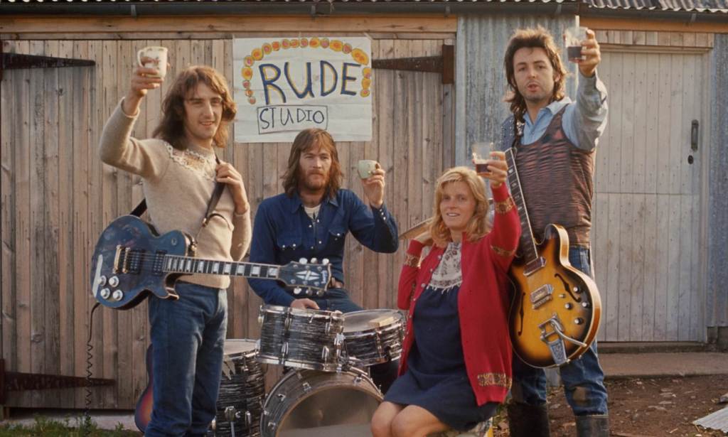 Sir Paul McCartney and late wife Linda toast the launch of his second band Wings in newly released&nbsp;photo